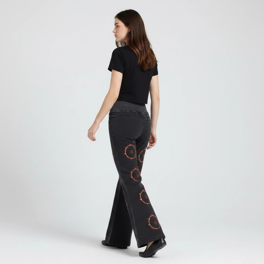 SOFUA Women's Flare Fleece Pants — washed black flared fleece pants with eclipse marks down both legs, back view